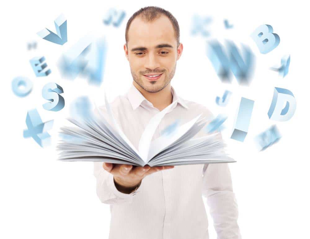 Adult man holding an opened book and reading. Letters are flying from the book. Self education of business school concept